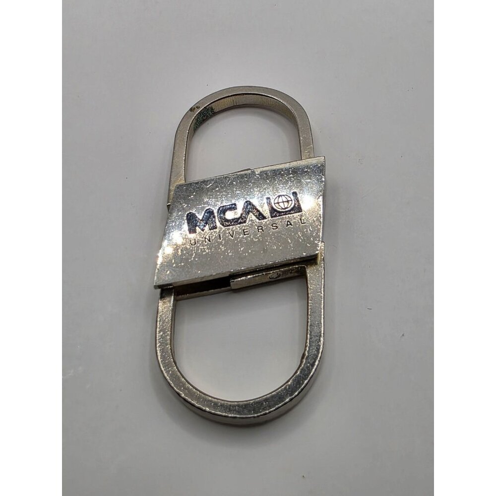 MCA Universal Studios Vintage Logo Clip Keychain Carabiner Style Silver Tone
